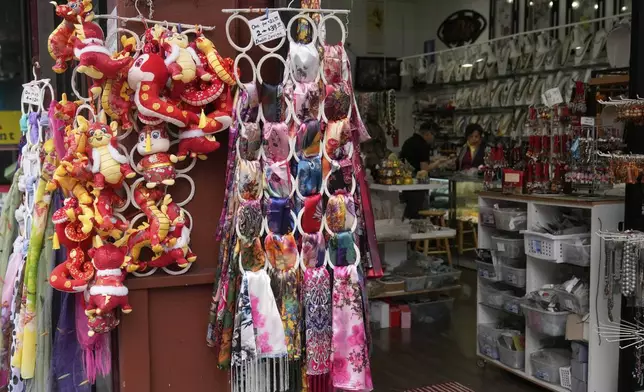 Products are displayed at C.K. Color Stone and Beads shop in Chinatown in San Francisco, Friday, April 18, 2025. (AP Photo/Jeff Chiu)