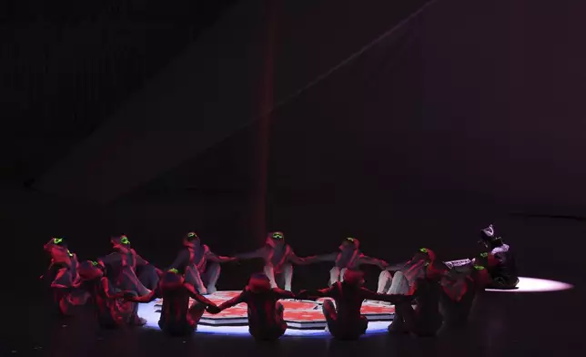 Artists perform during the opening ceremony of the Osaka Expo 2025 in Osaka, western Japan Saturday, April 12, 2025. (Jia Haocheng/Pool Photo via AP)