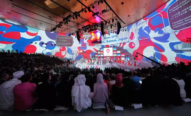 Guests watch the opening ceremony of Osaka Expo 2025 in Osaka, western Japan, Saturday, April 12, 2025. (AP Photo/Hiro Komae)