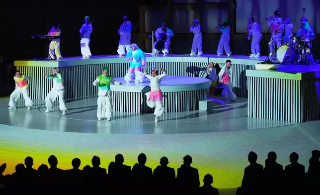 Artists perform during the opening ceremony of Osaka Expo 2025 in Osaka, western Japan, Saturday, April 12, 2025. (AP Photo/Hiro Komae)