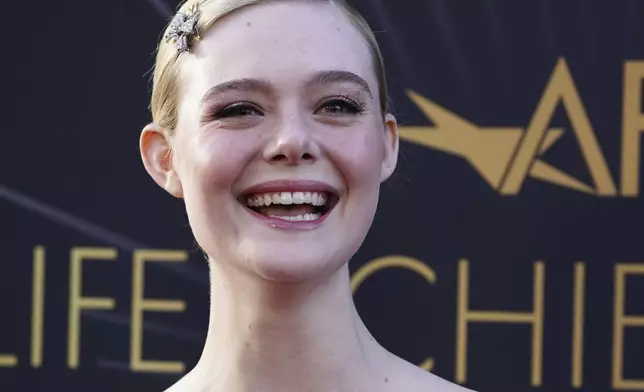 Elle Fanning arrives at the 50th AFI Life Achievement Award tribute to Francis Ford Coppola on Saturday, April 26, 2025, at the Dolby Theatre in Los Angeles. (Photo by Jordan Strauss/Invision/AP)