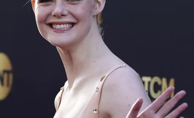 Elle Fanning arrives at the 50th AFI Life Achievement Award tribute to Francis Ford Coppola on Saturday, April 26, 2025, at the Dolby Theatre in Los Angeles. (Photo by Jordan Strauss/Invision/AP)