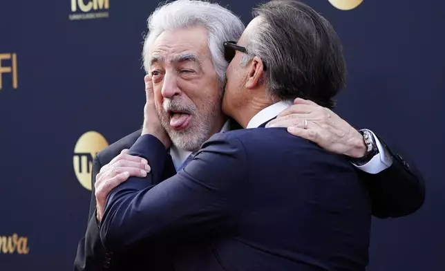 Joe Mantegna, left, and Andy García arrive at the 50th AFI Life Achievement Award tribute to Francis Ford Coppola on Saturday, April 26, 2025, at the Dolby Theatre in Los Angeles. (Photo by Jordan Strauss/Invision/AP)