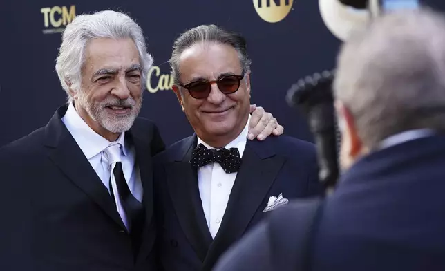 Joe Mantegna, left, and Andy García arrive at the 50th AFI Life Achievement Award tribute to Francis Ford Coppola on Saturday, April 26, 2025, at the Dolby Theatre in Los Angeles. (Photo by Jordan Strauss/Invision/AP)