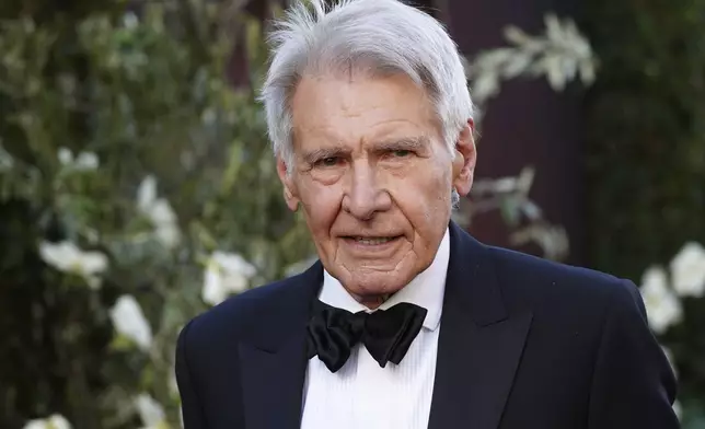 Harrison Ford arrives at the 50th AFI Life Achievement Award tribute to Francis Ford Coppola on Saturday, April 26, 2025, at the Dolby Theatre in Los Angeles. (Photo by Jordan Strauss/Invision/AP)