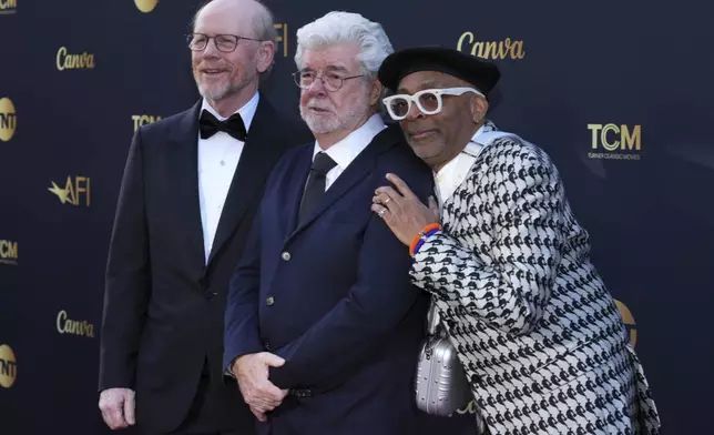 Ron Howard, from left, George Lucas and Spike Lee arrives at the 50th AFI Life Achievement Award tribute to Francis Ford Coppola on Saturday, April 26, 2025, at the Dolby Theatre in Los Angeles. (Photo by Jordan Strauss/Invision/AP)