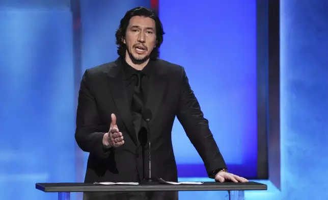 Actor Adam Driver addresses the audience during the 50th AFI Life Achievement Award tribute to Francis Ford Coppola on Saturday, April 26, 2025, at the Dolby Theatre in Los Angeles. (AP Photo/Chris Pizzello)