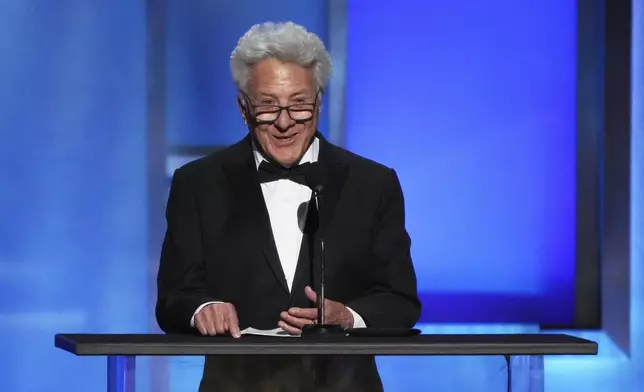 Actor Dustin Hoffman speaks from the podium during the 50th AFI Life Achievement Award tribute to Francis Ford Coppola on Saturday, April 26, 2025, at the Dolby Theatre in Los Angeles. (AP Photo/Chris Pizzello)