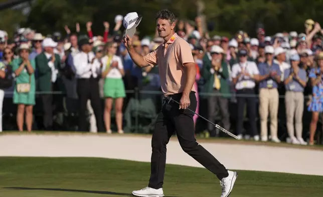 Justin Rose celebrates after a birdie on the 18th hole during the final round at the Masters golf tournament, Sunday, April 13, 2025, in Augusta, Ga. (AP Photo/Matt Slocum)