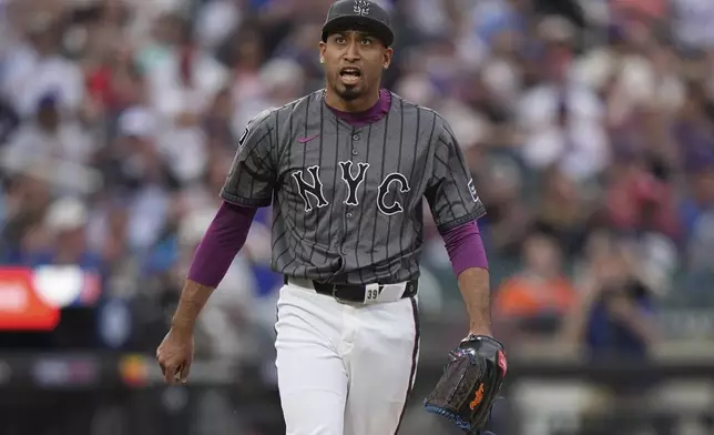 New York Mets pitcher Edwin Díaz reacts after striking out St. Louis Cardinals' Nolan Gorman during the ninth inning of a baseball game Saturday, April 19, 2025, in New York. (AP Photo/Frank Franklin II)