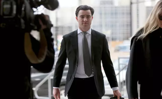 Dillon Dube, one of five members of Canada’s 2018 world junior hockey team charged with sexual assault last year for an incident that allegedly took place in June 2018, arrives at the London Courthouse in London, Ontario, Wednesday, April 23, 2025. (Nicole Osborne/The Canadian Press via AP)