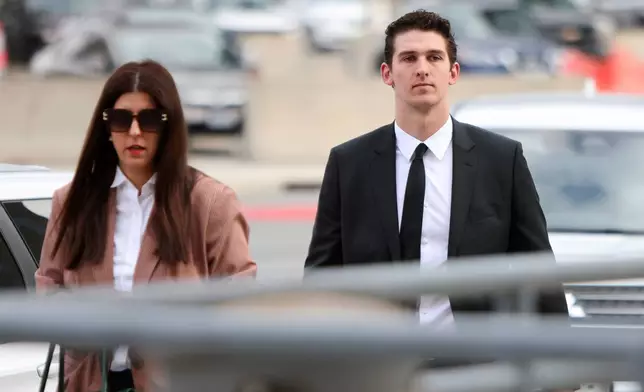 Cal Foote, one of five members of Canada’s 2018 world junior hockey team charged with sexual assault last year for an incident that allegedly took place in June 2018, arrives at the London Courthouse in London, Ontario, Wednesday, April 23, 2025. (Nicole Osborne/The Canadian Press via AP)