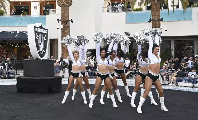 The Raiderettes perform at the Las Vegas Raiders NFL football draft party Thursday, April 24, 2025, in Las Vegas. (AP Photo/Candice Ward)