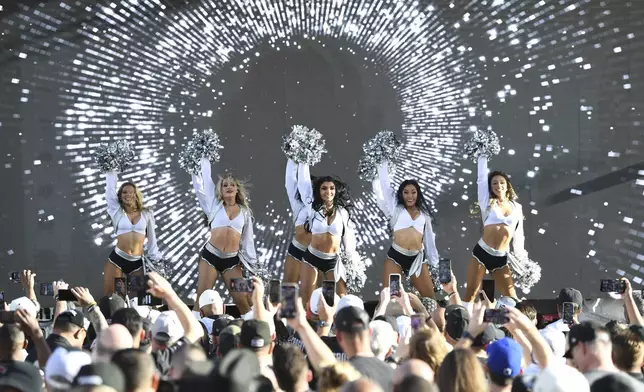 The Raiderettes perform during the Las Vegas Raiders NFL football draft party Thursday, April 24, 2025, in Las Vegas. (AP Photo/Candice Ward)