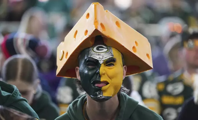 A Green Bay Packers fan watches during the third day of the NFL football draft, Saturday, April 26, 2025, in Green Bay, Wis. (AP Photo/Jeff Roberson)