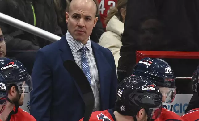 FILE - Washington Capitals head coach Spencer Carbery watches the action from the bench during the first period of an NHL hockey game Saturday, Jan. 4, 2025, in Washington. (AP Photo/John McDonnell, File)