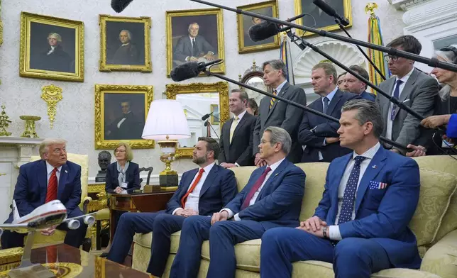 President Donald Trump speaks while meeting with Italy's Prime Minister Giorgia Meloni (unseen) in the Oval Office of the White House, Thursday, April 17, 2025, in Washington, as Vice President JD Vance, Treasury Secretary Scott Bessent and Defense Secretary Pete Hegseth listen. (AP Photo/Alex Brandon)