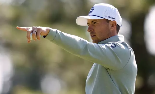 Jordan Spieth looks over the green on the sixth hole during a practice around at the Masters golf tournament, Wednesday, April 9, 2025, in Augusta, Ga. (AP Photo/Ashley Landis)