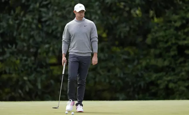 Rory McIlroy, of Northern Ireland, walks on the green on the fifth hole during a practice around at the Masters golf tournament, Wednesday, April 9, 2025, in Augusta, Ga. (AP Photo/Ashley Landis)