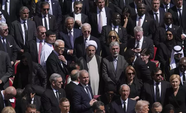 Former President Joe Biden, center, and President Donald Trump, lower right, and other dignitaries, attend the funeral of Pope Francis in St. Peter's Square at the Vatican, Saturday, April 26, 2025.(AP Photo/Evan Vucci)