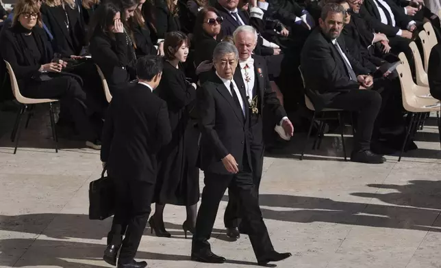 Japan's Foreign Minister Esteri Takeshi Iwaya, arrives at the funeral of Pope Francis in St. Peter's Square at the Vatican, Saturday, April 26, 2025. (AP Photo/Evan Vucci)