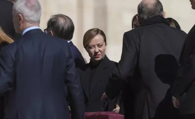 Italian Premier Giorgia Meloni arrives for the funeral of Pope Francis in St. Peter's Square at the Vatican, Saturday, April 26, 2025. (AP Photo/Alessandra Tarantino)