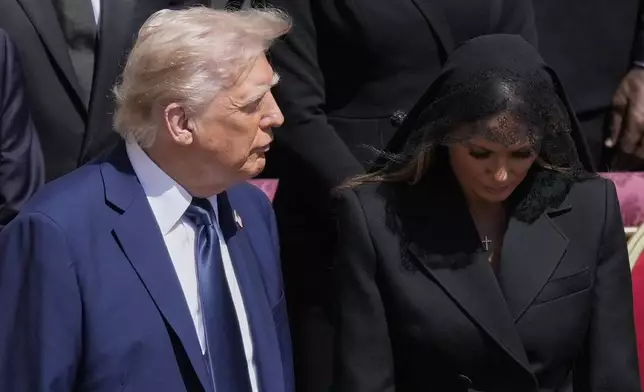 President Donald Trump and first lady Melania Trump attend the funeral of Pope Francis in St. Peter's Square at the Vatican, Saturday, April 26, 2025. (AP Photo/Gregorio Borgia)