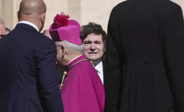 Argentina's President Javier Milei arrives for the funeral of Pope Francis in St. Peter's Square at the Vatican, Saturday, April 26, 2025. (AP Photo/Alessandra Tarantino)