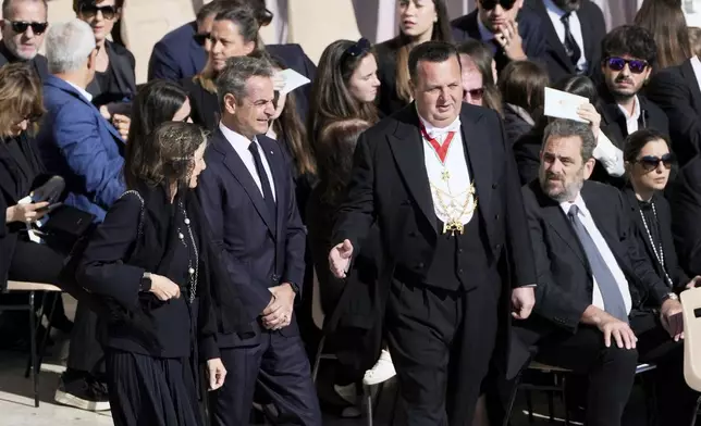 Greek Prime Minister Kyriakos Mitsotakis, center right, arrives for the funeral of Pope Francis in St. Peter's Square at the Vatican, Saturday, April 26, 2025. (AP Photo/Markus Schreiber)
