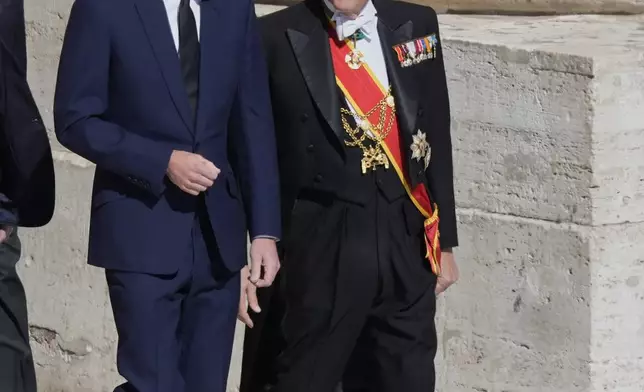 Britain's Prince William, left, arrives for the funeral of Pope Francis in St. Peter's Square at the Vatican, Saturday, April 26, 2025. (AP Photo/Gregorio Borgia)