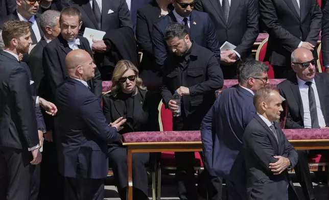 Ukraine's President Volodymr Zelenskyy and first lady Olena Zelenska at the end of the funeral of Pope Francis in St. Peter's Square at the Vatican, Saturday, April 26, 2025. (AP Photo/Gregorio Borgia)