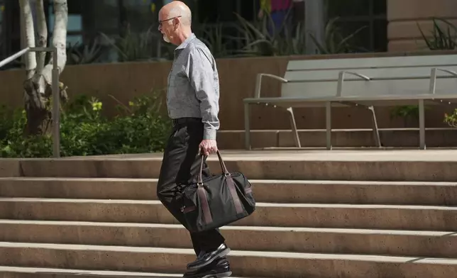 Lori Vallow Daybell's uncle Rex Conner leaves Maricopa County Courthouse after attending the murder trial of Vallow Daybell, who is charged with conspiring to murder her estranged husband, Monday, April 21, 2025, in Phoenix. (AP Photo/Ross D. Franklin)