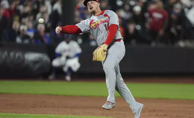 St. Louis Cardinals' Nolan Gorman (16) throws out New York Mets' Mark Vientos during the eighth inning of a baseball game Thursday, April 17, 2025, in New York. (AP Photo/Frank Franklin II)