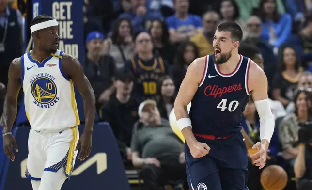 Los Angeles Clippers center Ivica Zubac (40) reacts after scoring against the Golden State Warriors during the first half of an NBA basketball game Sunday, April 13, 2025, in San Francisco. (AP Photo/Godofredo A. Vásquez)