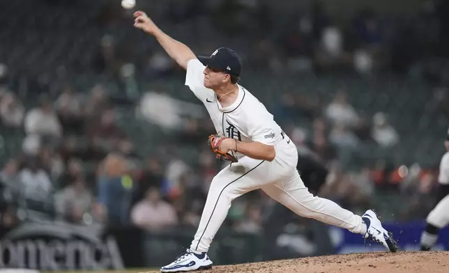 Detroit Tigers pitcher Beau Brieske throws against the Kansas City Royals in the eighth inning during a baseball game, Thursday, April 17, 2025, in Detroit. (AP Photo/Paul Sancya)