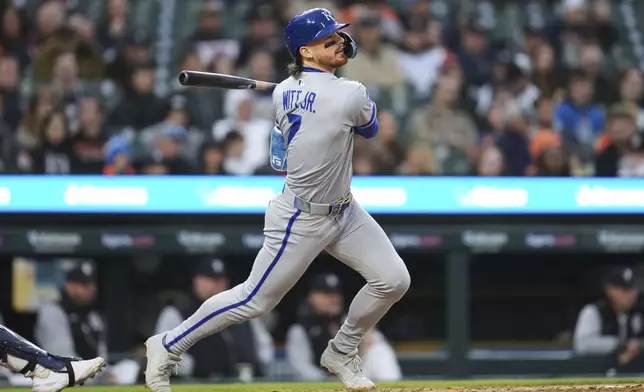 Kansas City Royals' Bobby Witt Jr. hits a double against the Detroit Tigers in the fifth inning during a baseball game, Thursday, April 17, 2025, in Detroit. (AP Photo/Paul Sancya)