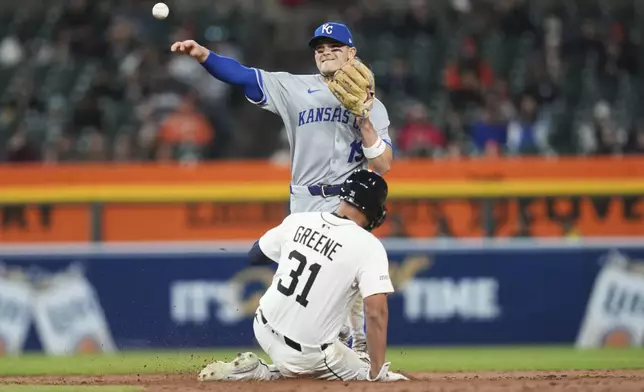 Kansas City Royals second baseman Michael Massey throws to first base late after the force out on Detroit Tigers' Riley Greene (31) in the seventh inning during a baseball game, Thursday, April 17, 2025, in Detroit. (AP Photo/Paul Sancya)