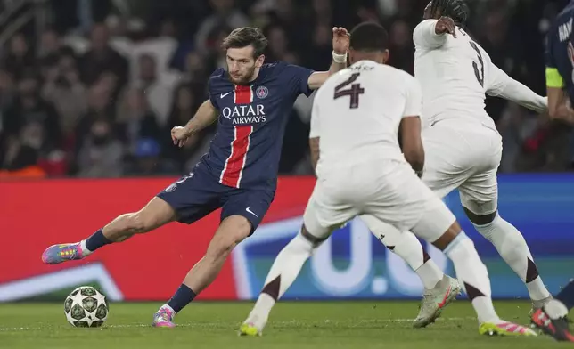 PSG's Khvicha Kvaratskhelia in action during the Champions League quarterfinal first leg soccer match between Paris Saint-Germain and Aston Villa at Parc des Princes stadium in Paris, Wednesday, April 9, 2025. (AP Photo/Thibault Camus)