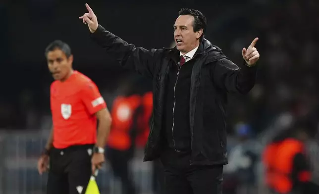 Aston Villa's head coach Unai Emery gestures during the Champions League quarterfinal first leg soccer match between Paris Saint-Germain and Aston Villa at Parc des Princes stadium in Paris, Wednesday, April 9, 2025. (AP Photo/Aurelien Morissard)