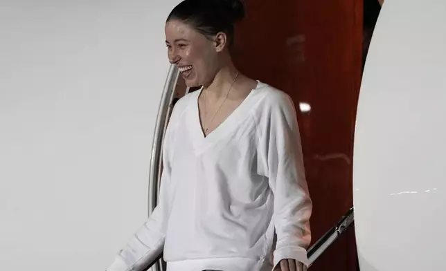 Ksenia Karelina arrives Thursday, April 10, 2025, at Joint Base Andrews, Md. (AP Photo/Alex Brandon)