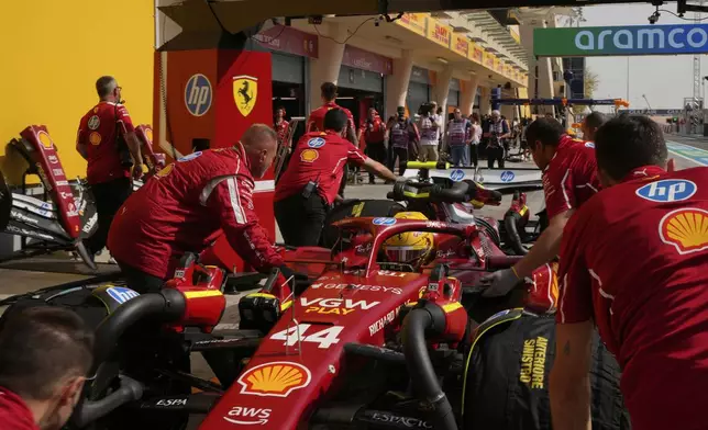 Ferrari driver Lewis Hamilton of Britain stops in the pit lane during the Formula One 2025 Bahrain Grand Prix, in Sakhir, Friday, April 11, 2025. (AP Photo/Darko Bandic)