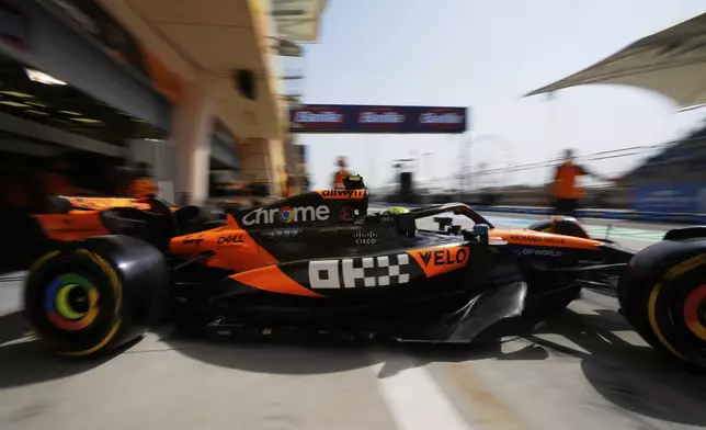 McLaren driver Lando Norris of Britain leaves the pit lane during the Formula One 2025 Bahrain Grand Prix, in Sakhir, Friday, April 11, 2025. (AP Photo/Darko Bandic)