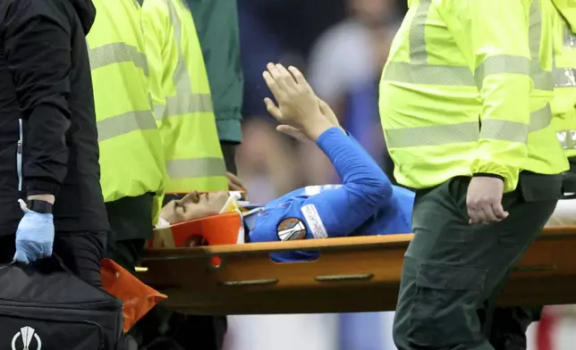 Rangers' Bailey Rice is carried off on a stretcher, during the UEFA Europa League quarterfinal, first leg soccer match between Rangers and Athletic Bilbao at Ibrox Stadium, Glasgow, Scotland, Thursday April 10, 2025. (Steve Welsh/PA via AP)