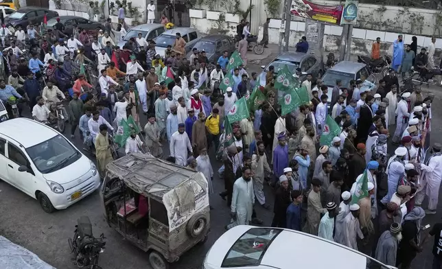 Supporters of the Pakistani religious group "Sunni Tehreek" take part in a rally against Israeli airstrikes and to show solidarity with Palestinian people living in Gaza, in Karachi, Pakistan Friday, April 11, 2025. (AP Photo/Fareed Khan)