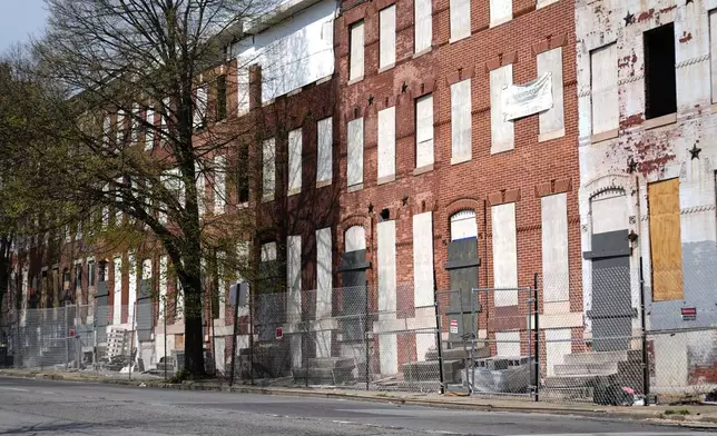 Abandoned row homes are seen in the Sandtown-Winchester neighborhood in Baltimore, Monday, April 14, 2025. (AP Photo/Stephanie Scarbrough)