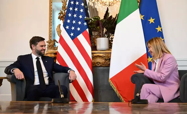 U.S. Vice President JD Vance meets with Italian Prime Minister Giorgia Meloni at Chigi Palace in Rome, Italy, Friday April 18, 2025. (Kenny Holston/The New York Times via AP, Pool)