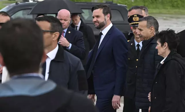 Vice President JD Vance arrives in Rome, Friday April 18, 2025. (Kenny Holston/The New York Times via AP, Pool)