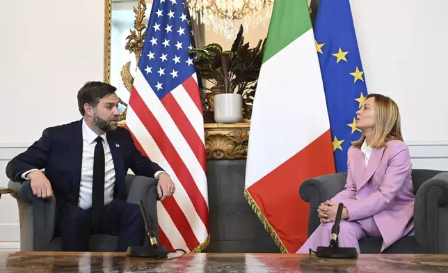 U.S. Vice President JD Vance meets with Italian Prime Minister Giorgia Meloni at Chigi Palace in Rome, Italy, Friday April 18, 2025. (Kenny Holston/The New York Times via AP, Pool)