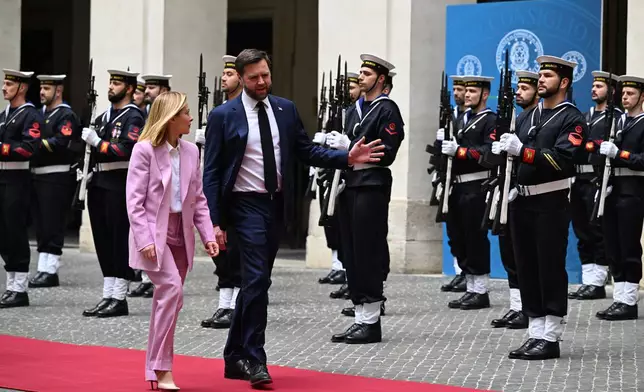 U.S. Vice President JD Vance meets with Italian Prime Minister Giorgia Meloni at Chigi Palace in Rome, Italy, Friday April 18, 2025. (Kenny Holston/The New York Times via AP, Pool)