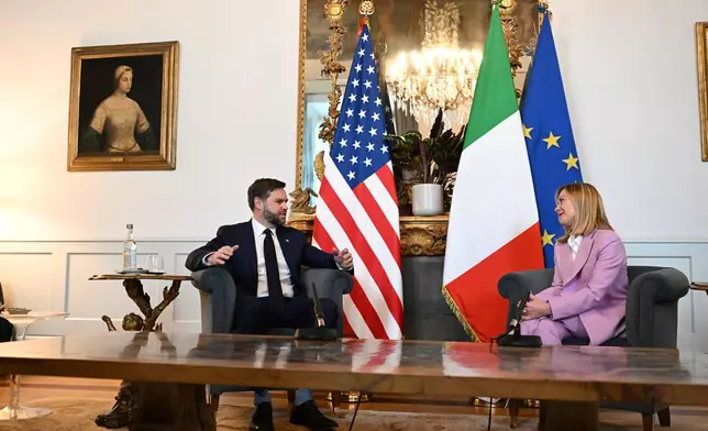 U.S. Vice President JD Vance meets with Italian Prime Minister Giorgia Meloni at Chigi Palace in Rome, Italy, Friday April 18, 2025. (Kenny Holston/The New York Times via AP, Pool)